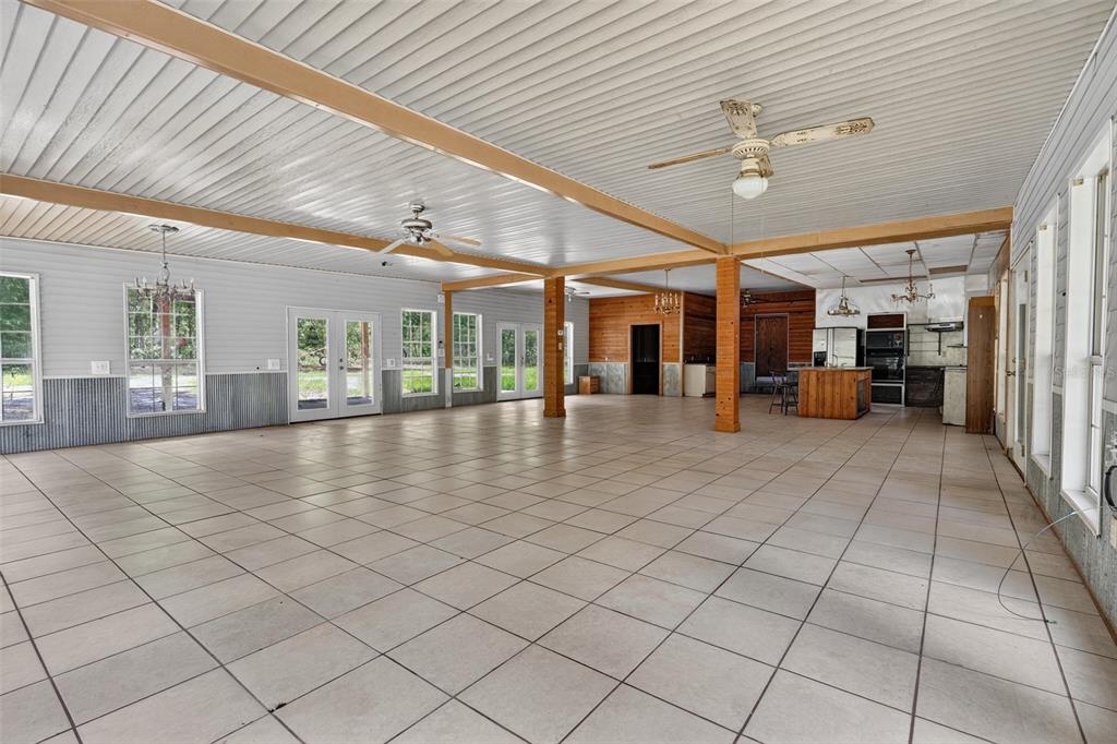 3749 Southwest 22nd Place Bell, FL 32619 - Photo 12 of 43 a view of a hall with table and chairs