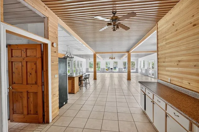 a kitchen with stainless steel appliances granite countertop a stove and a refrigerator