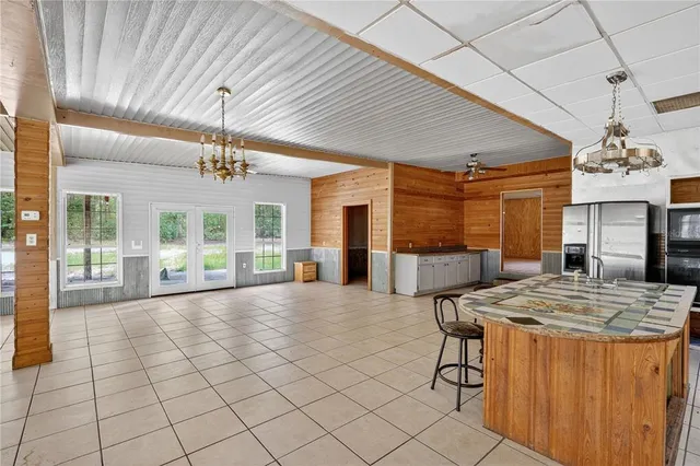a bathroom with a sink a toilet and a shower