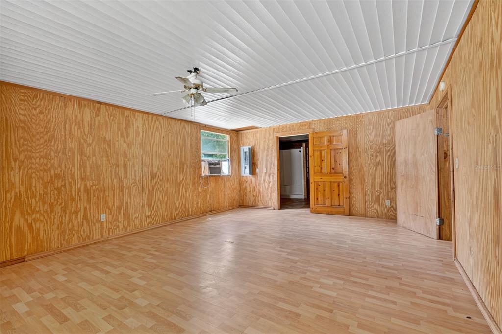 3749 Southwest 22nd Place Bell, FL 32619 - Photo 25 of 43 an empty room with windows