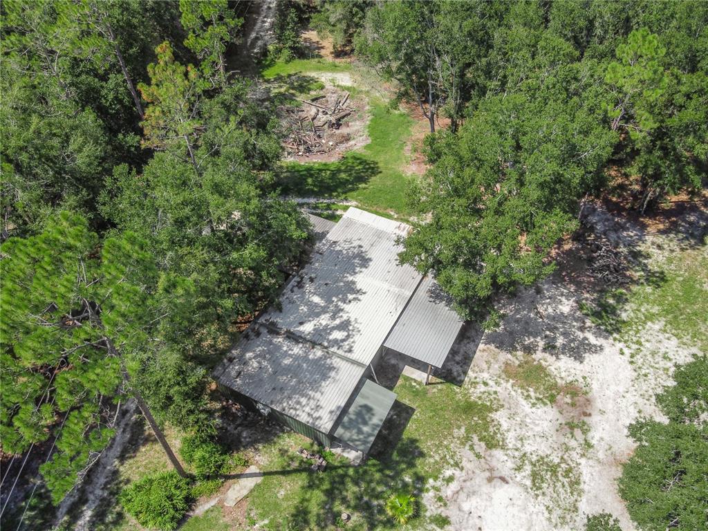 3749 Southwest 22nd Place Bell, FL 32619 - Photo 10 of 43 an aerial view of a house with a yard