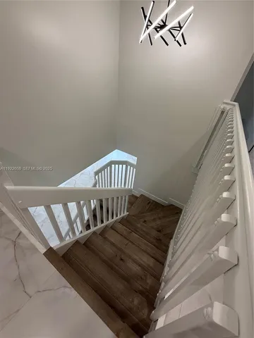 an empty room with windows and yard