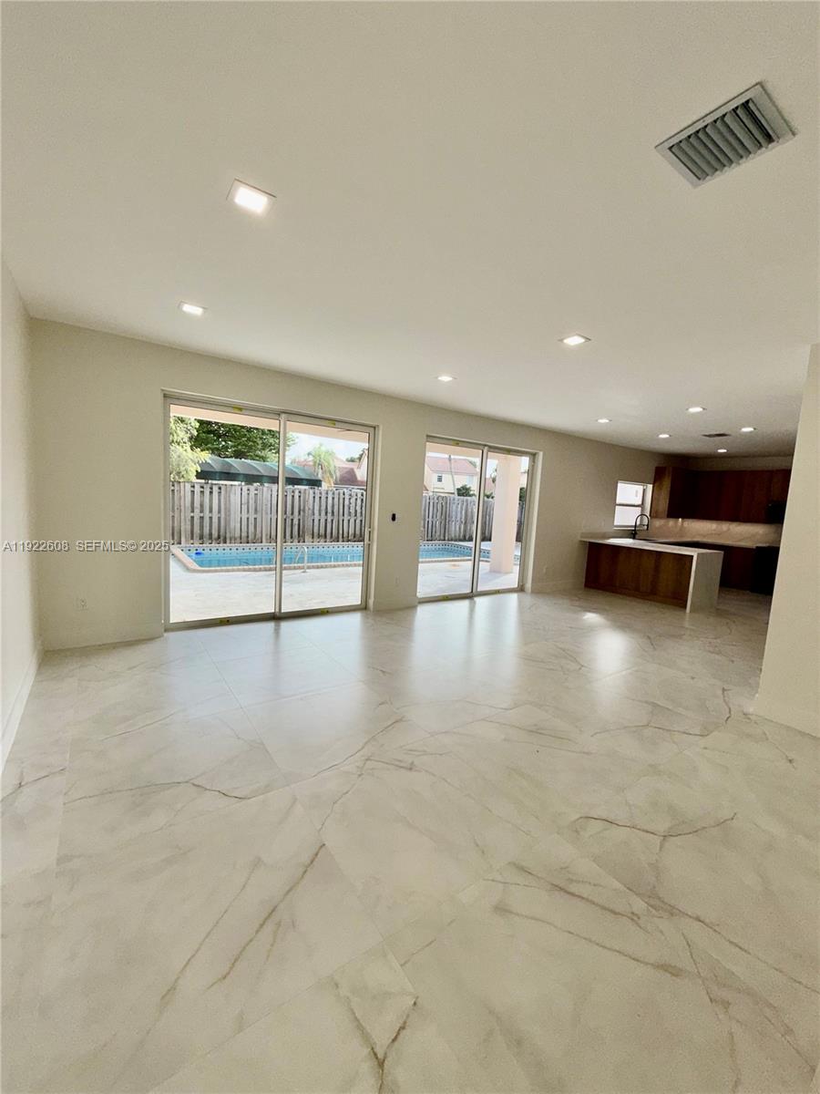 15254 Southwest 109th Street Miami, FL 33196 - Photo 39 of 48 a view of an empty room with a window