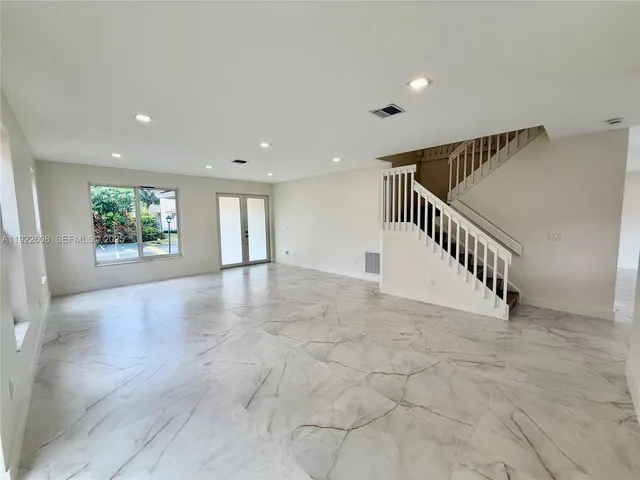 a view of an entryway with a window