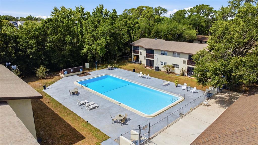 141 Fernery Road, Unit A3 Lakeland, FL 33809 - Photo 27 of 40 an aerial view of a house with swimming pool