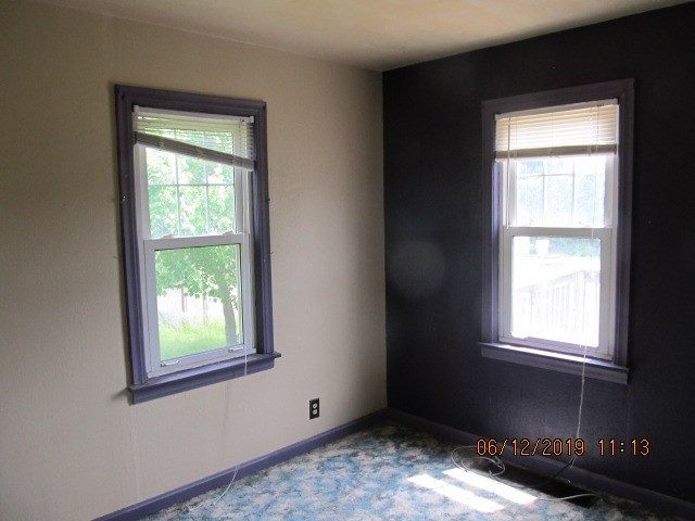 1494 Thompson Road Franklin, PA 16323 - Photo 12 of 21 a view of an empty room with a window