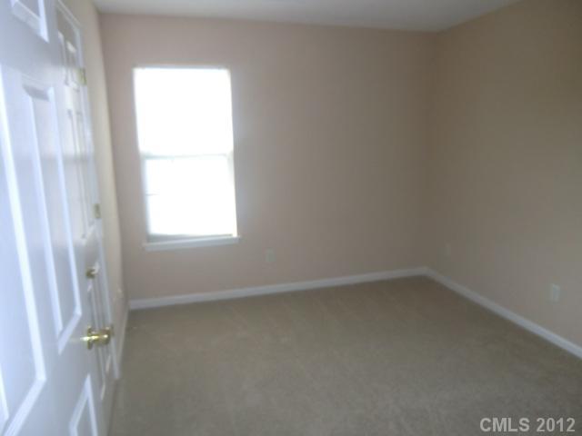 9033 Foggy Meadow Road Charlotte, NC 28269 - Photo 7 of 9 a view of room with window