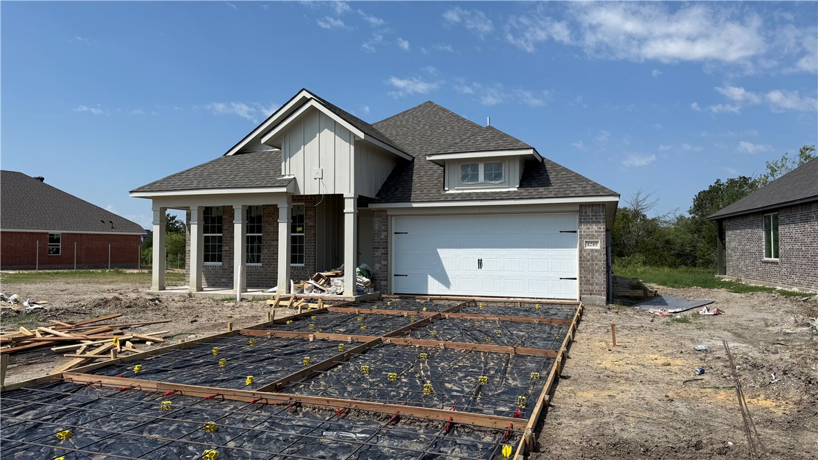 a front view of a house with yard