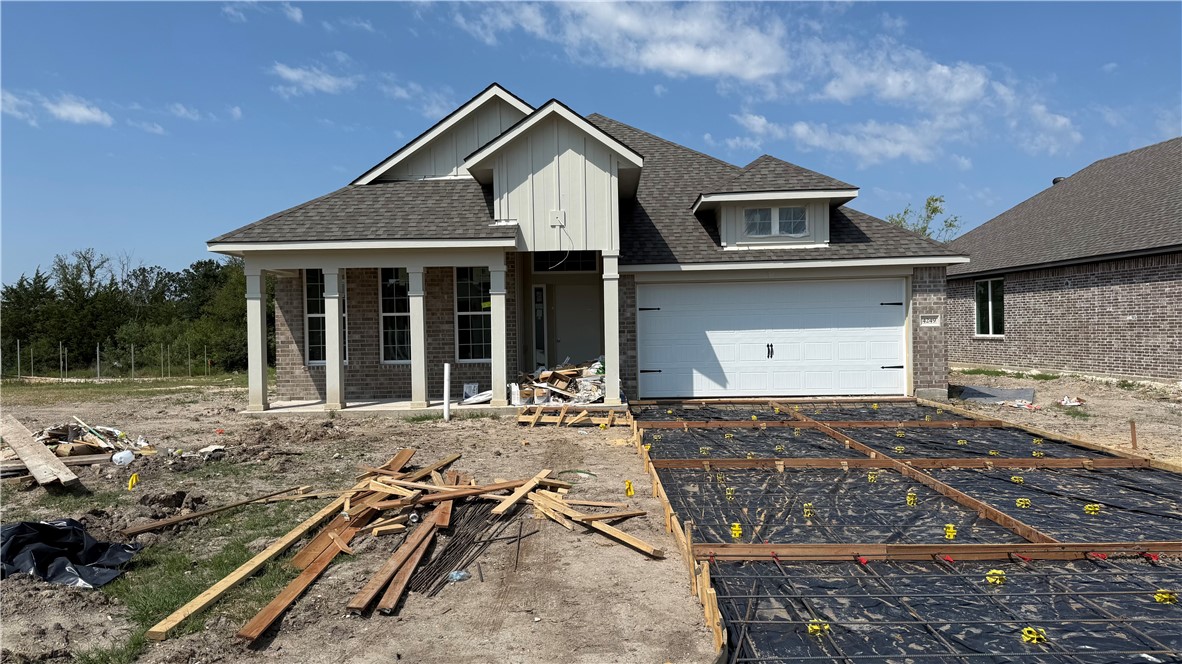 4249 Appalachian Trail Bryan, TX 77802 - Photo 2 of 11 a front view of a house with garden