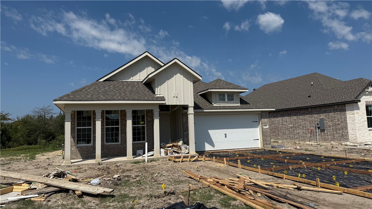 4249 Appalachian Trail Bryan, TX 77802 - Photo 3 of 11 a front view of a house with a yard