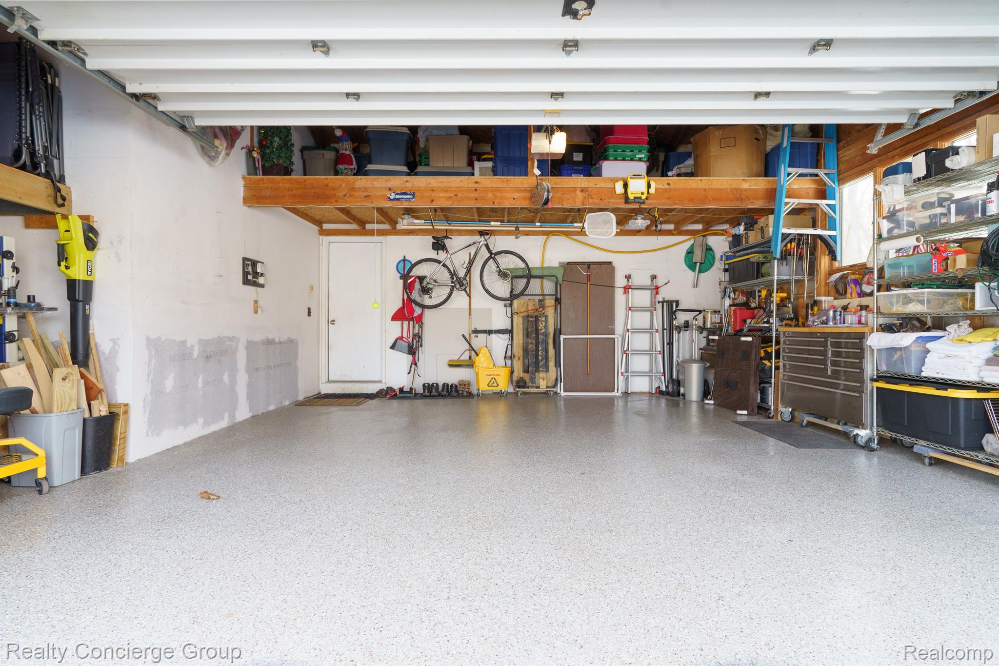 7170 Cowell Road Brighton, MI 48116 - Photo 38 of 38 Pristine attached 2-car garage is so spacious