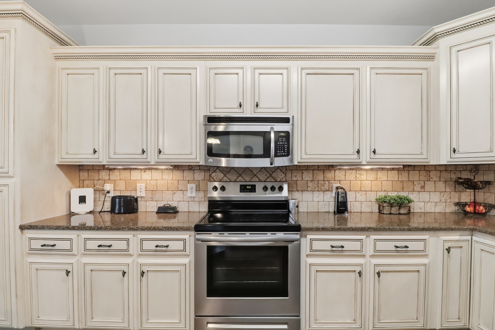 3287 Bluebird Road Lebanon, TN 37087 - Photo 29 of 59 a kitchen with white cabinets and white appliances