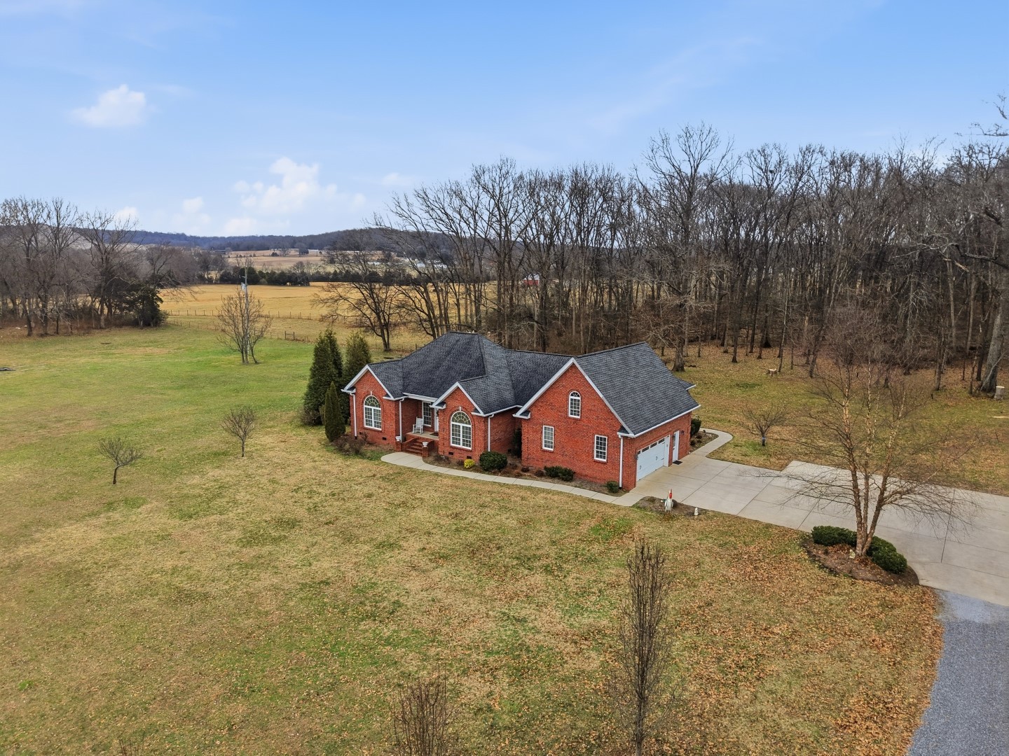 3287 Bluebird Road Lebanon, TN 37087 - Photo 7 of 59 a aerial view of a house with big yard and large trees