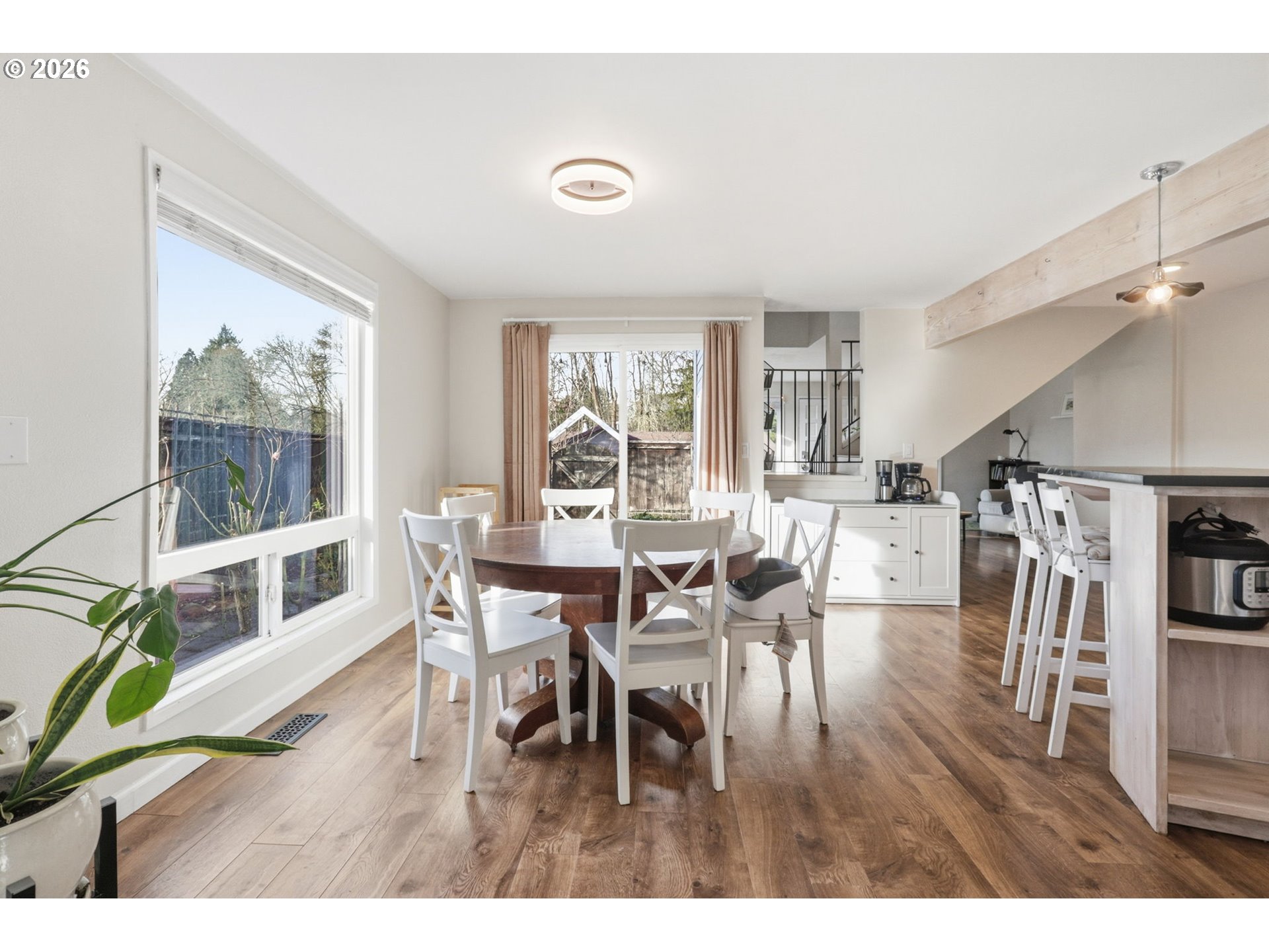 19350 Southwest Murphy Street Beaverton, OR 97078 - Photo 11 of 45 a dining room with furniture and wooden floor