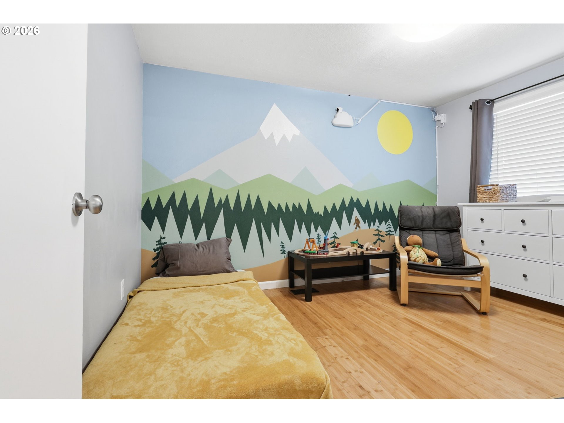 19350 Southwest Murphy Street Beaverton, OR 97078 - Photo 17 of 45 a living room with furniture and a wooden floor