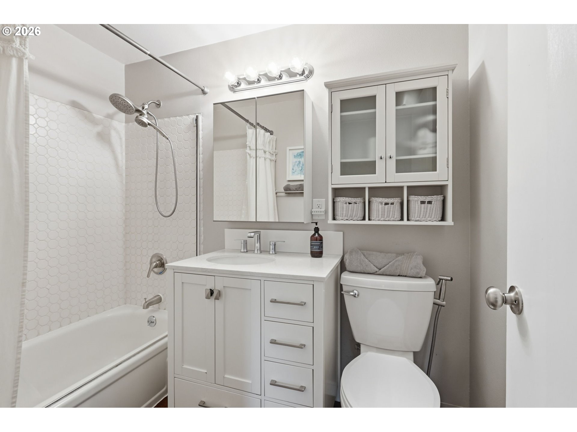 19350 Southwest Murphy Street Beaverton, OR 97078 - Photo 18 of 45 a bathroom with a granite countertop sink toilet and shower