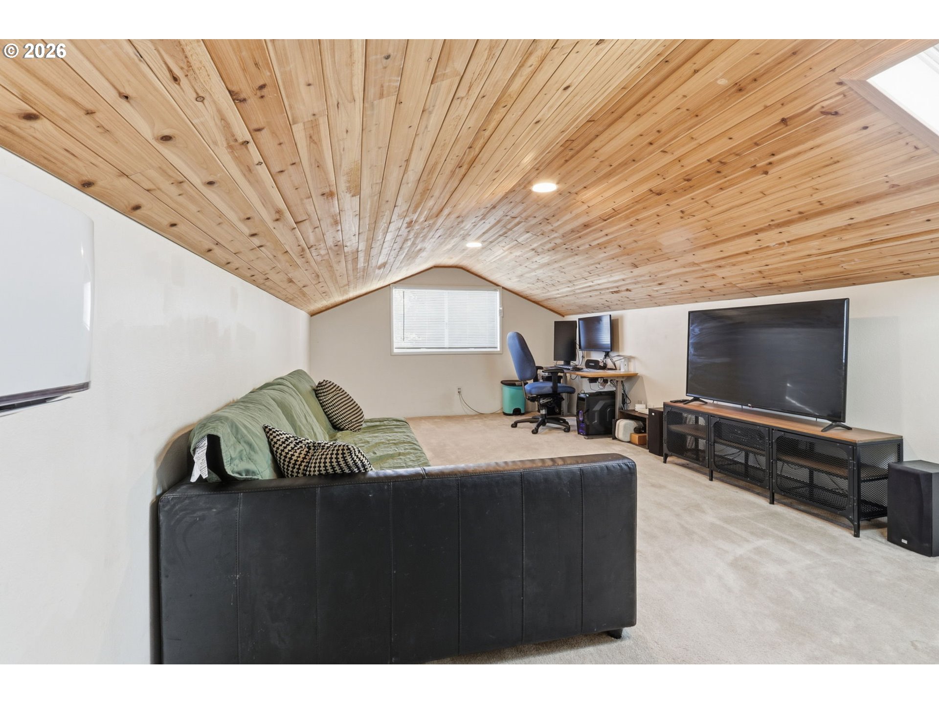 19350 Southwest Murphy Street Beaverton, OR 97078 - Photo 21 of 45 a living room with furniture and a flat screen tv