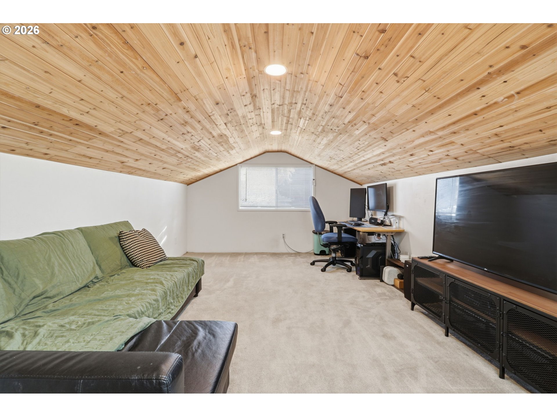 19350 Southwest Murphy Street Beaverton, OR 97078 - Photo 22 of 45 a living room with furniture and a flat screen tv