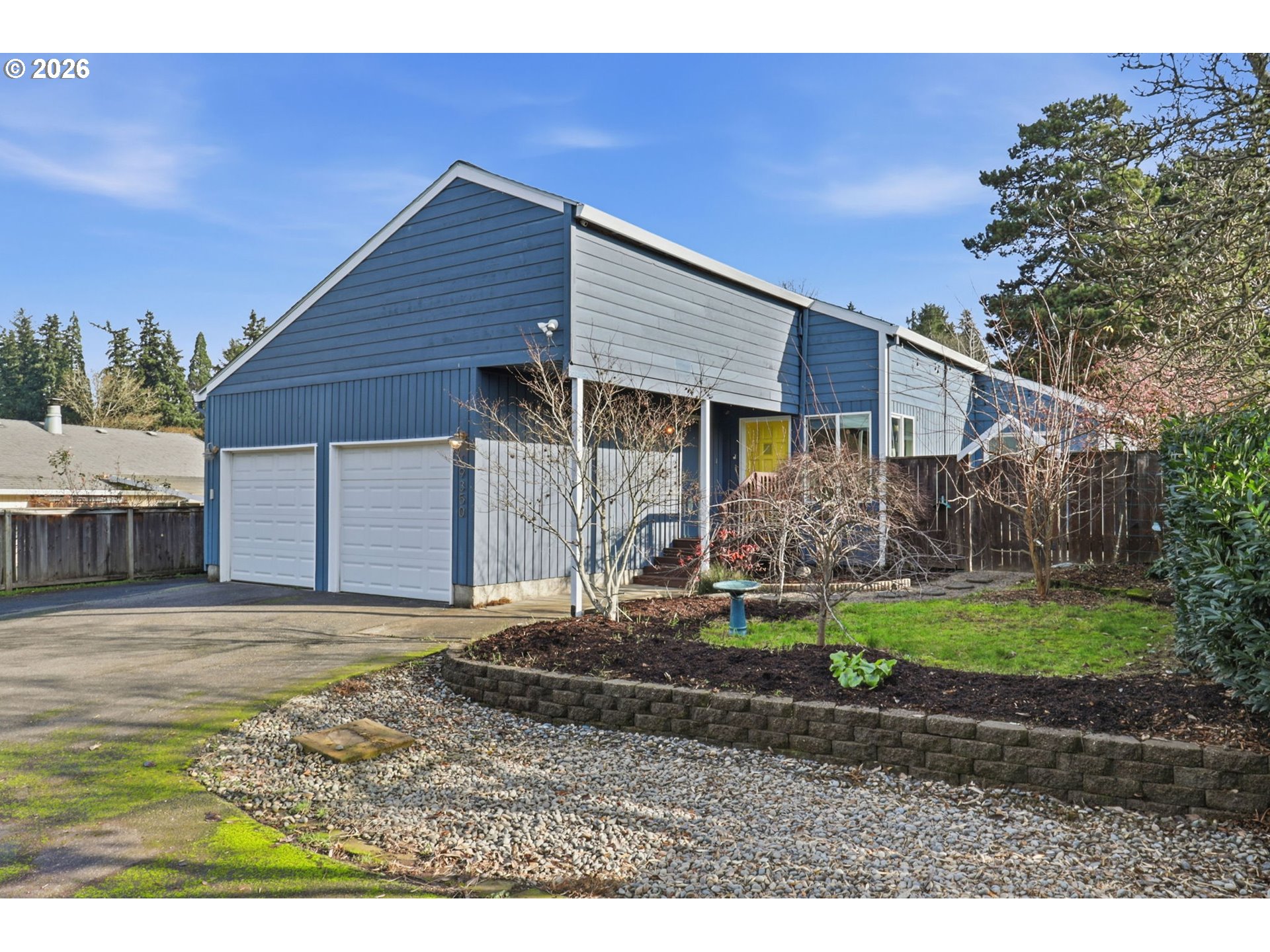 19350 Southwest Murphy Street Beaverton, OR 97078 - Photo 35 of 45 a front view of a house with garden