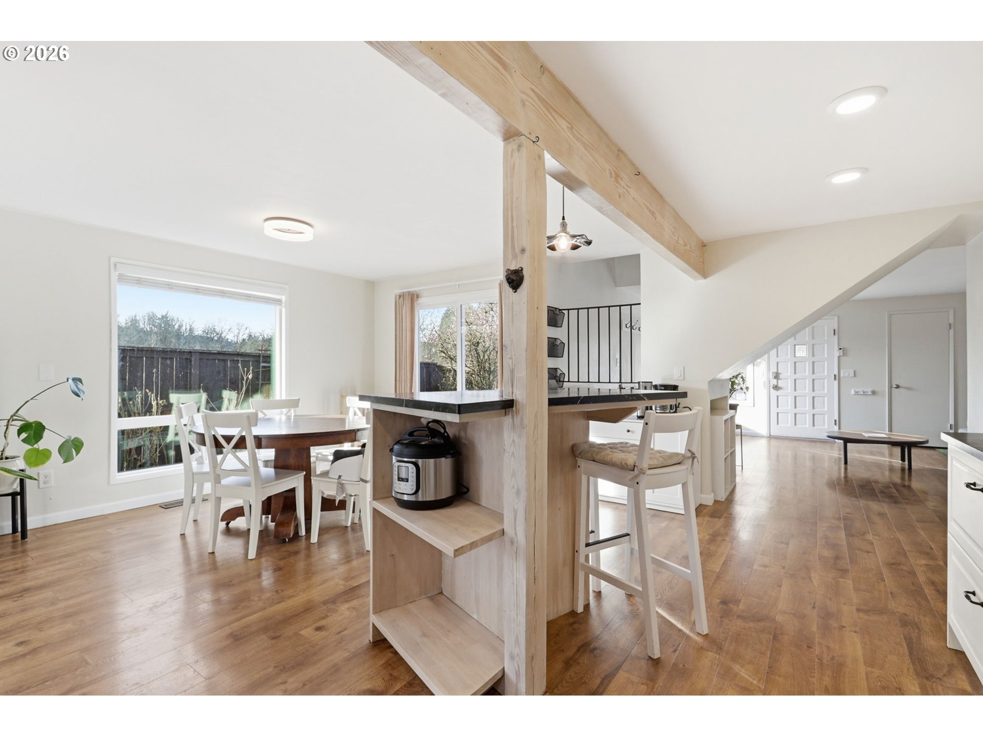 19350 Southwest Murphy Street Beaverton, OR 97078 - Photo 9 of 45 a dining room with furniture and wooden floor