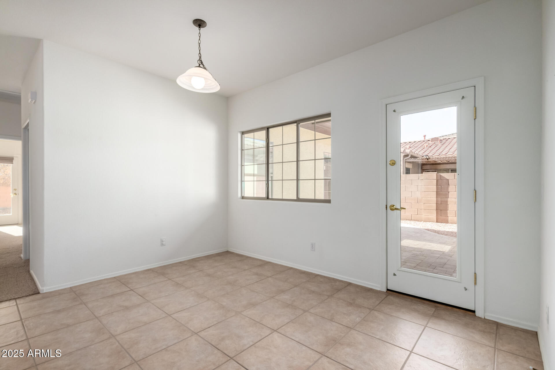 2602 South Nielson Street Gilbert, AZ 85295 - Photo 15 of 39 a view of an empty room with a window