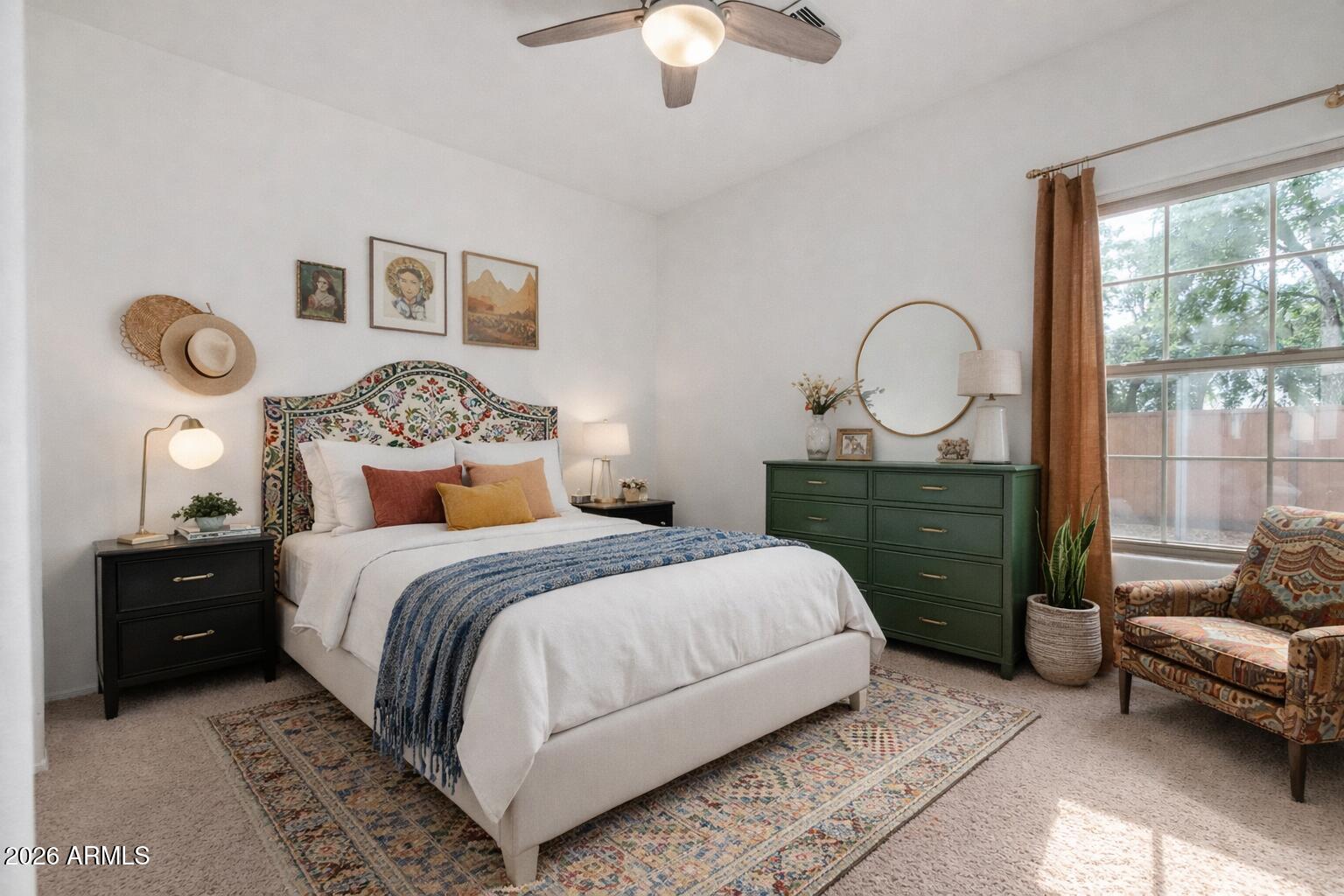 2602 South Nielson Street Gilbert, AZ 85295 - Photo 26 of 39 a bedroom with a bed and a chandelier