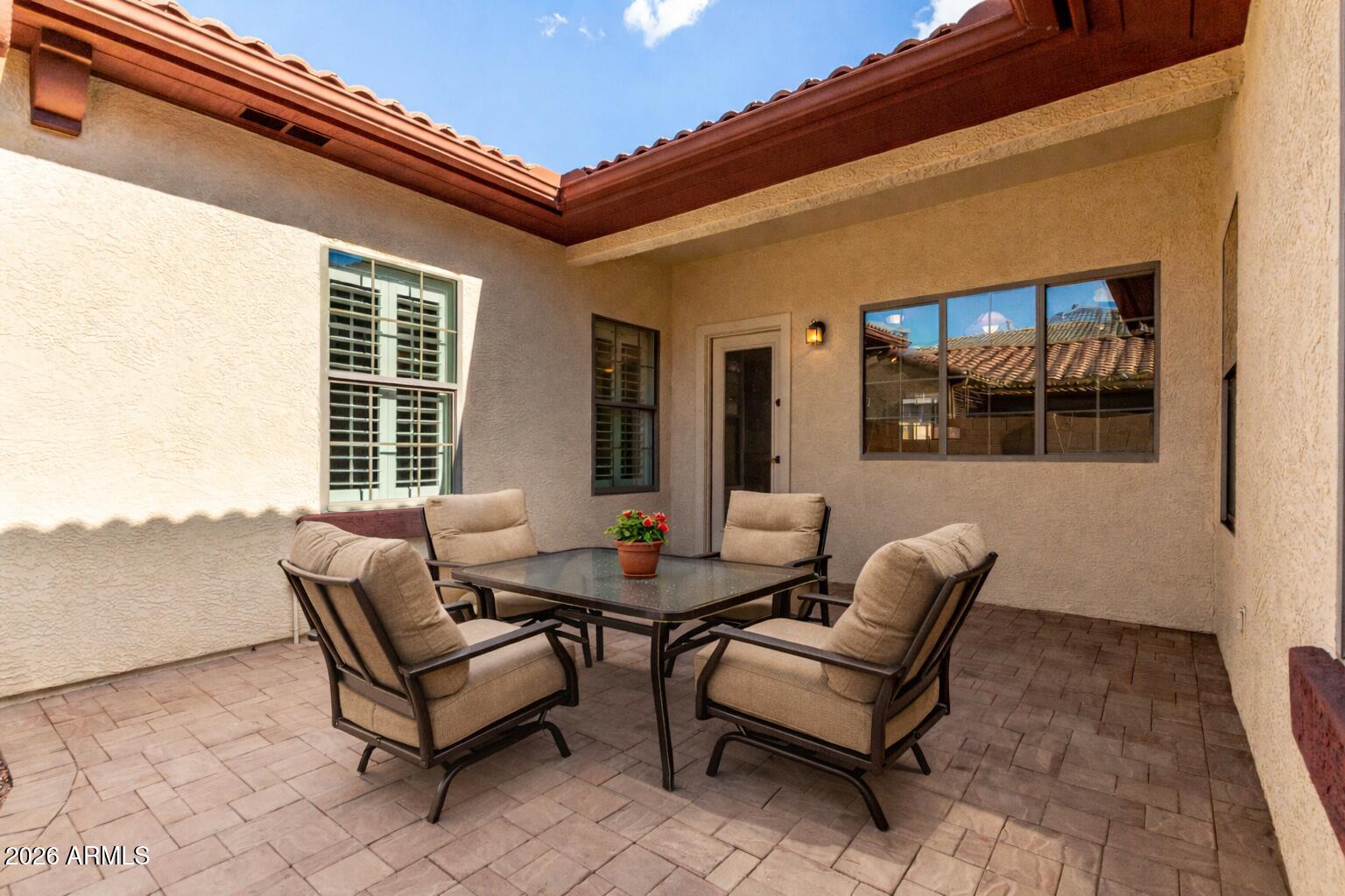 2602 South Nielson Street Gilbert, AZ 85295 - Photo 30 of 39 a outdoor living space with furniture and a ceiling fan