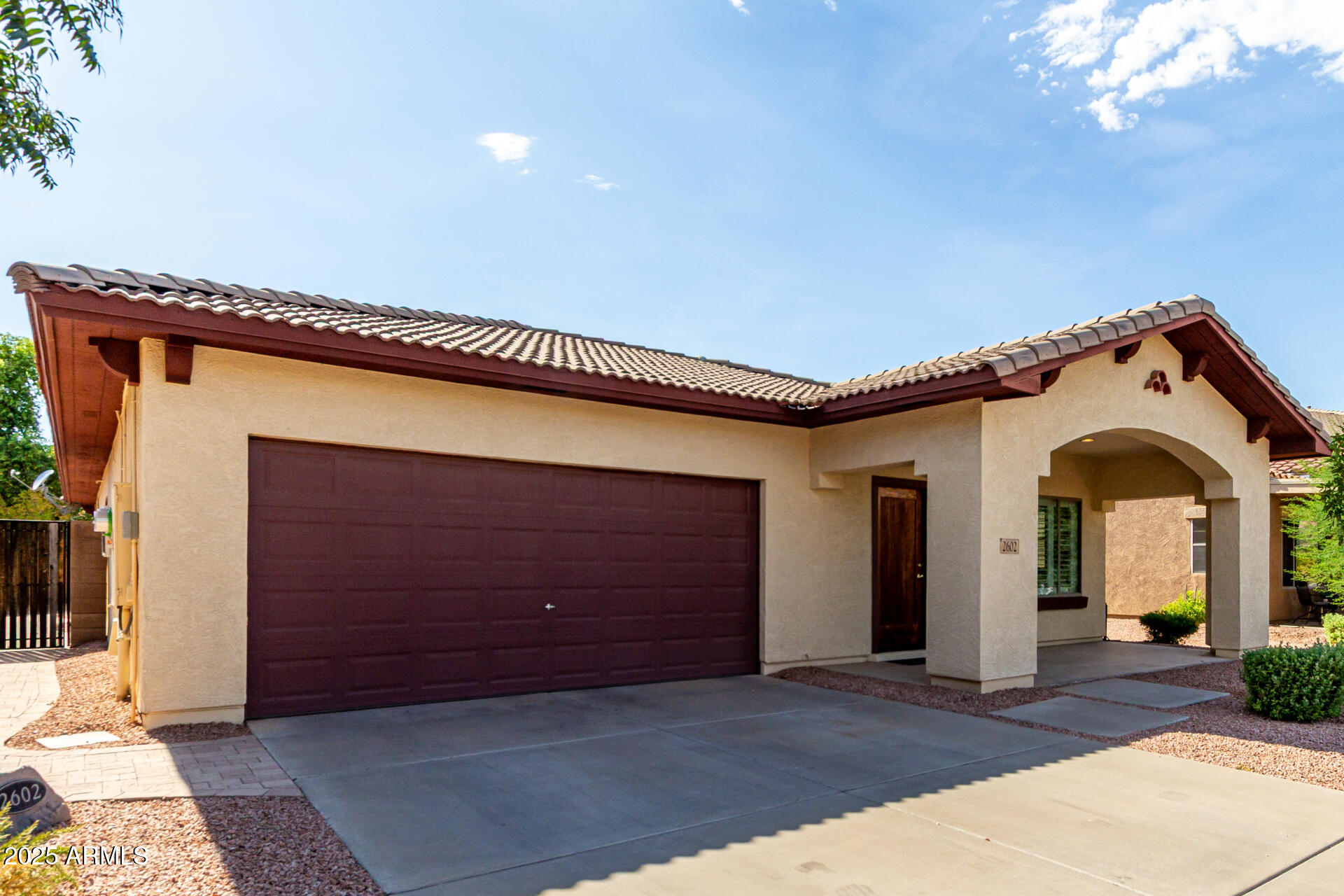 2602 South Nielson Street Gilbert, AZ 85295 - Photo 3 of 39 a view of a house with a porch