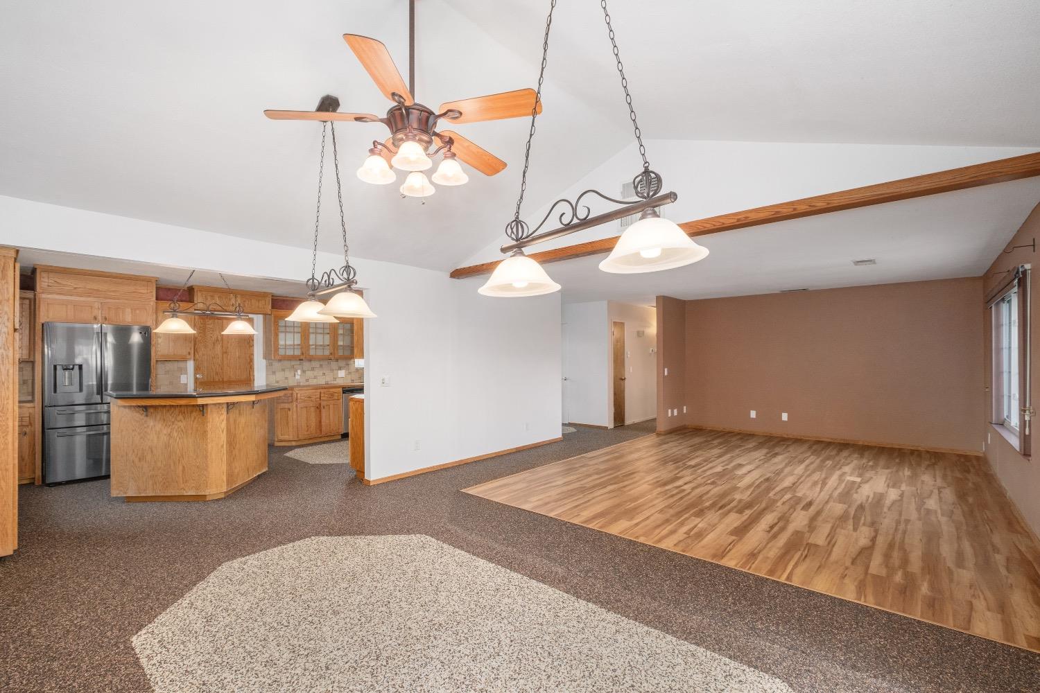 915 Fordham Avenue Clovis, CA 93611 - Photo 8 of 23 a view of a room with window and chandelier