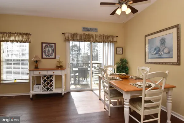 a outdoor space with furniture window and wooden floor