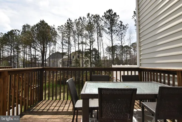 a view of a chairs on the roof deck