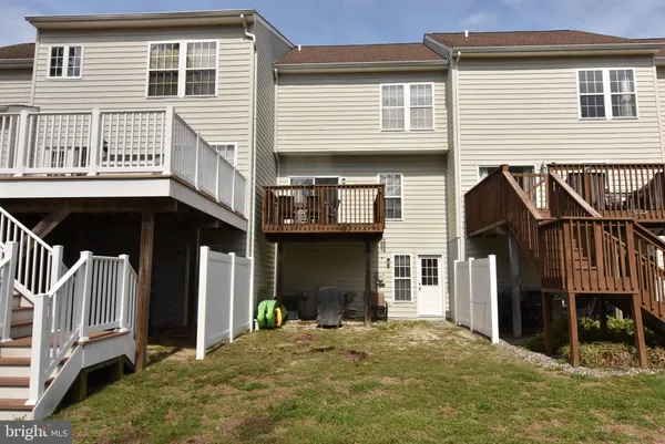 a front view of a house with a garage