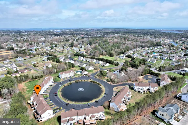 an aerial view of residential house with outdoor space