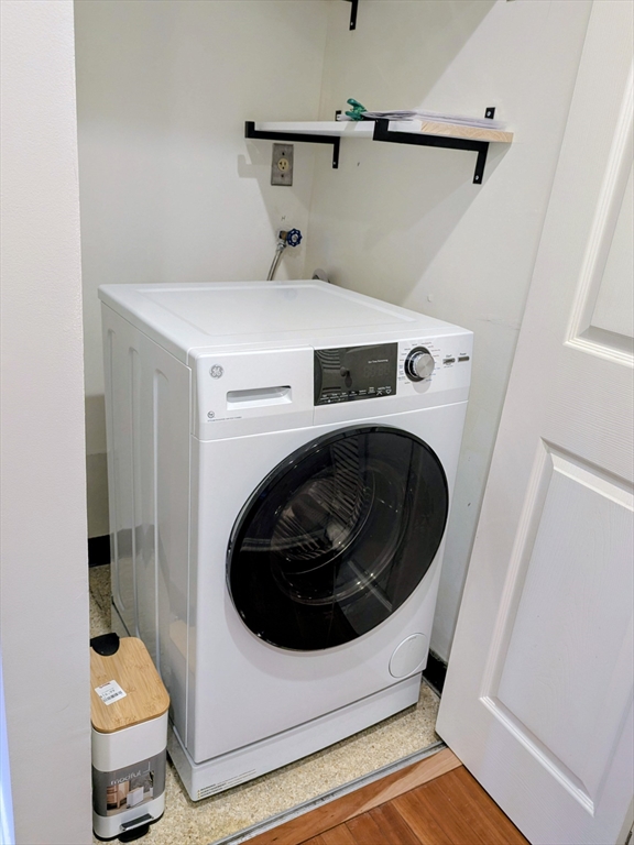 20 Central Street, Unit 405 Salem, MA 01970 - Photo 15 of 18 a utility room with dryer and washer