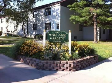 a sign that is sitting in front of a house