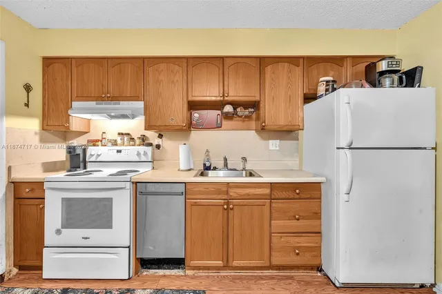a room with furniture and flat screen tv