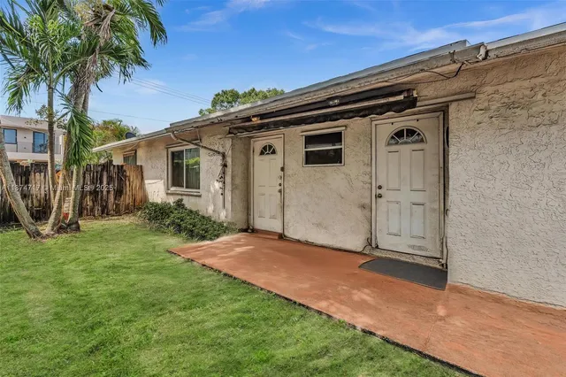 a view of a backyard with a garden