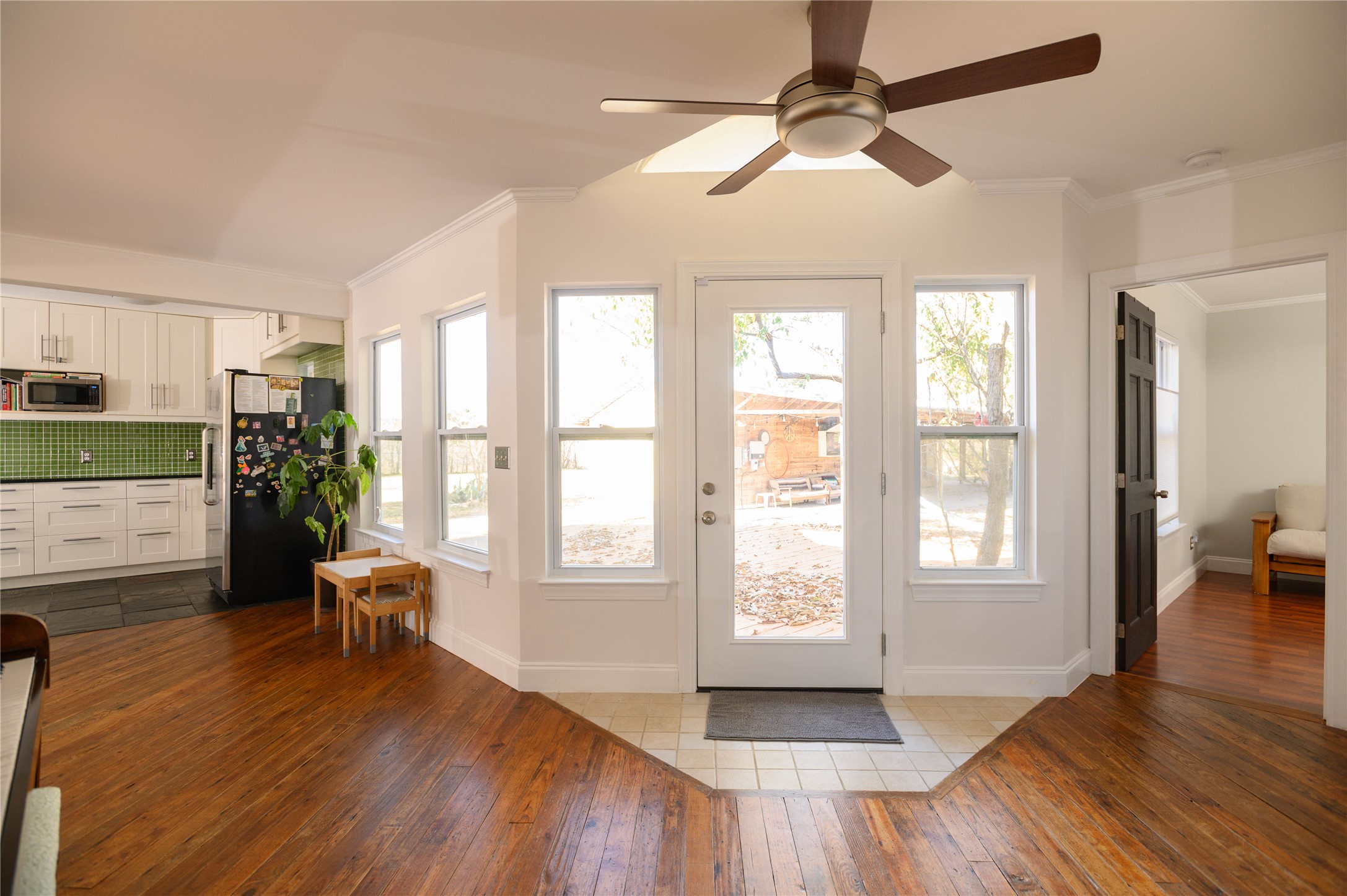 4902 Pecan Springs Road Austin, TX 78723 - Photo 25 of 40 a living room with furniture and a wooden floor