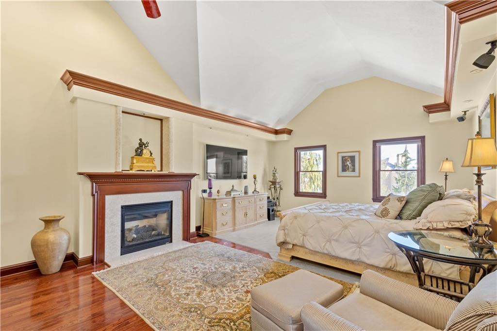 104 Gatehouse Drive Coraopolis, PA 15108 - Photo 15 of 24 a bedroom with a bed and a fireplace