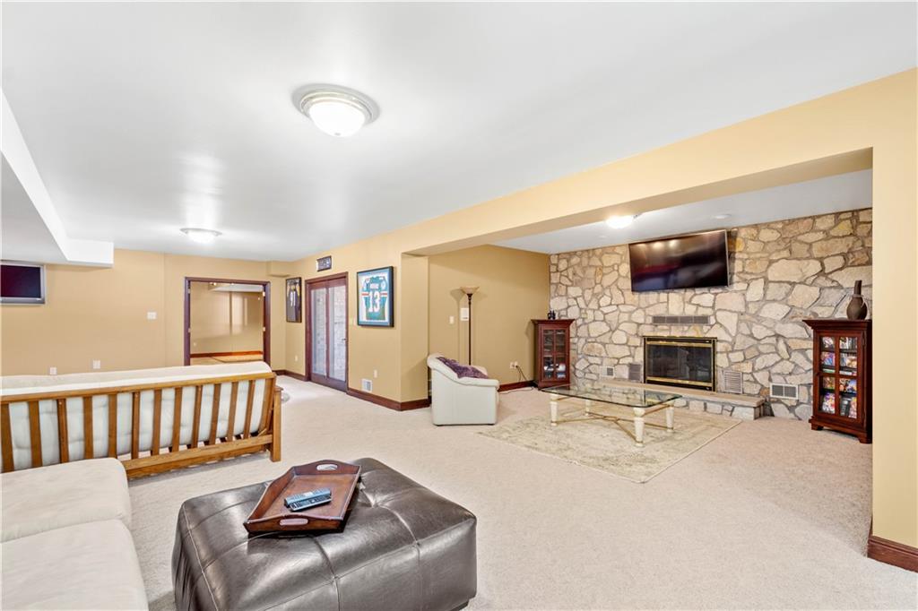 104 Gatehouse Drive Coraopolis, PA 15108 - Photo 22 of 24 a living room with fireplace furniture and a flat screen tv