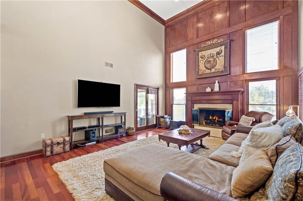104 Gatehouse Drive Coraopolis, PA 15108 - Photo 5 of 24 a living room with furniture a flat screen tv and a fireplace