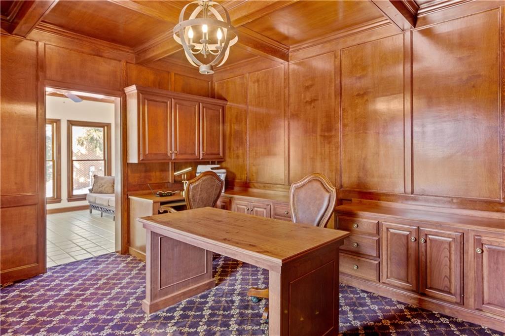 104 Gatehouse Drive Coraopolis, PA 15108 - Photo 8 of 24 a kitchen with a sink a table and chairs