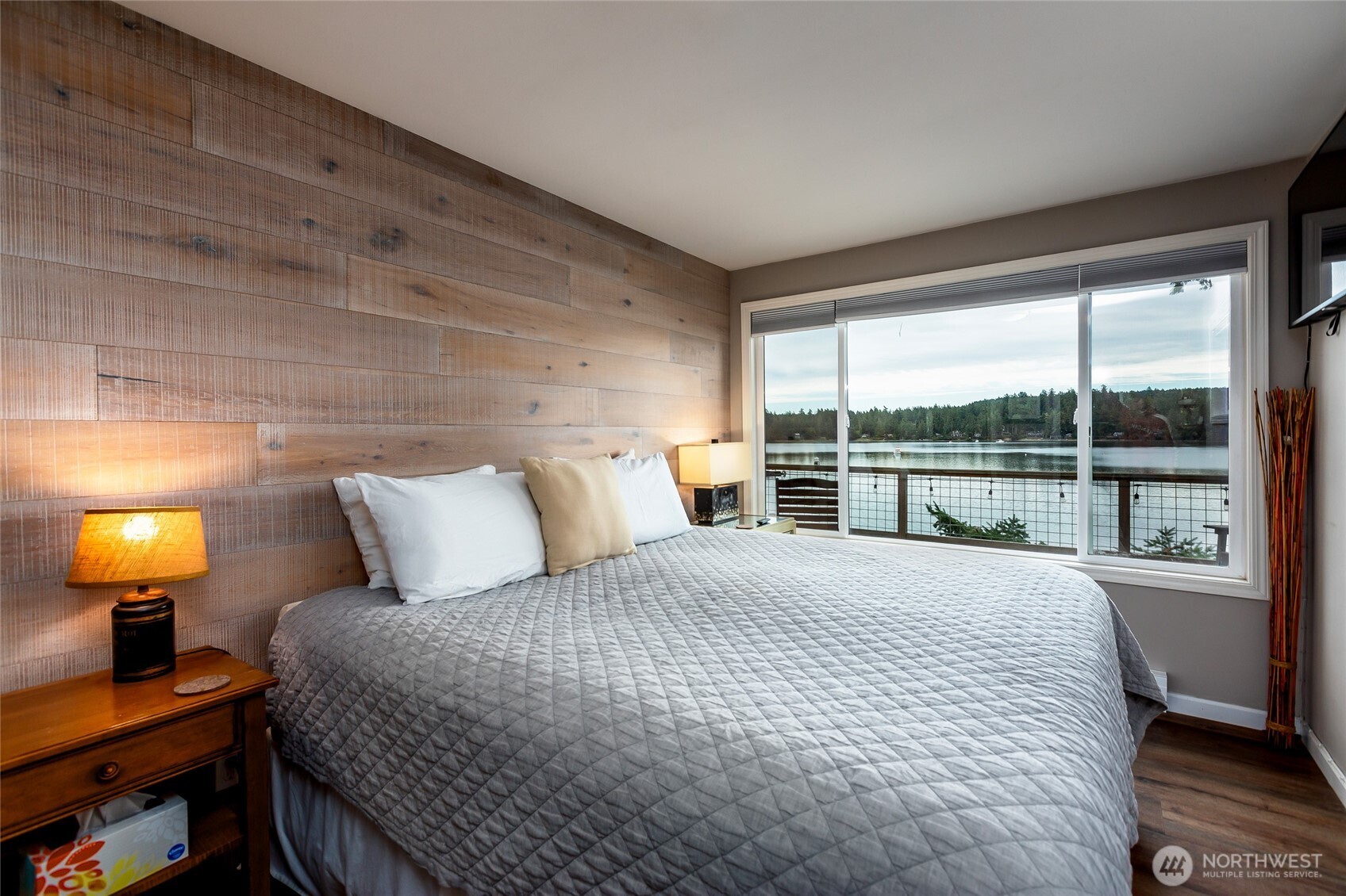 457 White Point Road Friday Harbor, WA 98250 - Photo 12 of 39 a large bed sitting in a bedroom next to a window