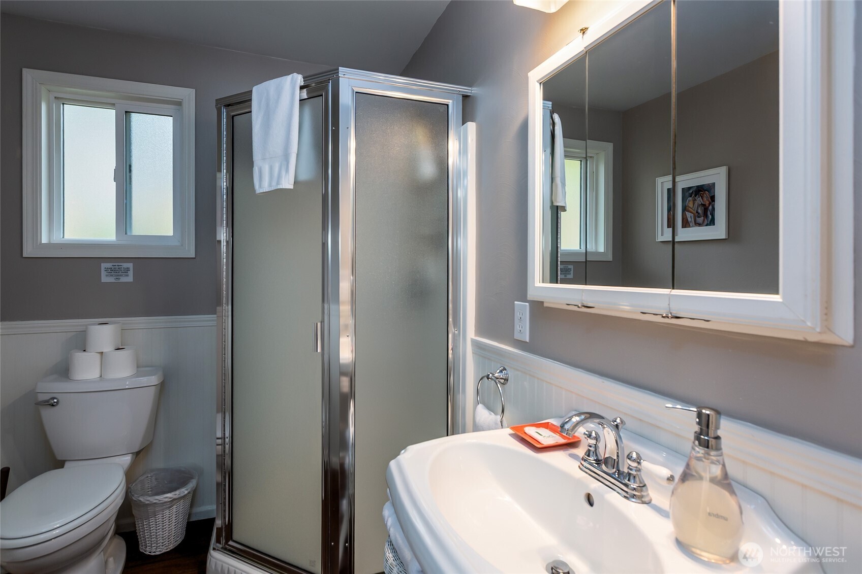 457 White Point Road Friday Harbor, WA 98250 - Photo 14 of 39 a bathroom with a sink toilet and shower