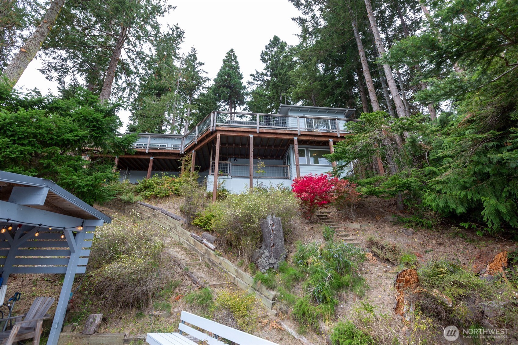 457 White Point Road Friday Harbor, WA 98250 - Photo 20 of 39 a view of house with a yard and potted plants