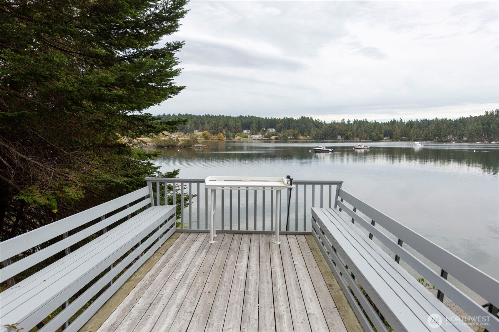 457 White Point Road Friday Harbor, WA 98250 - Photo 25 of 39 a view of balcony with wooden floor and lake view