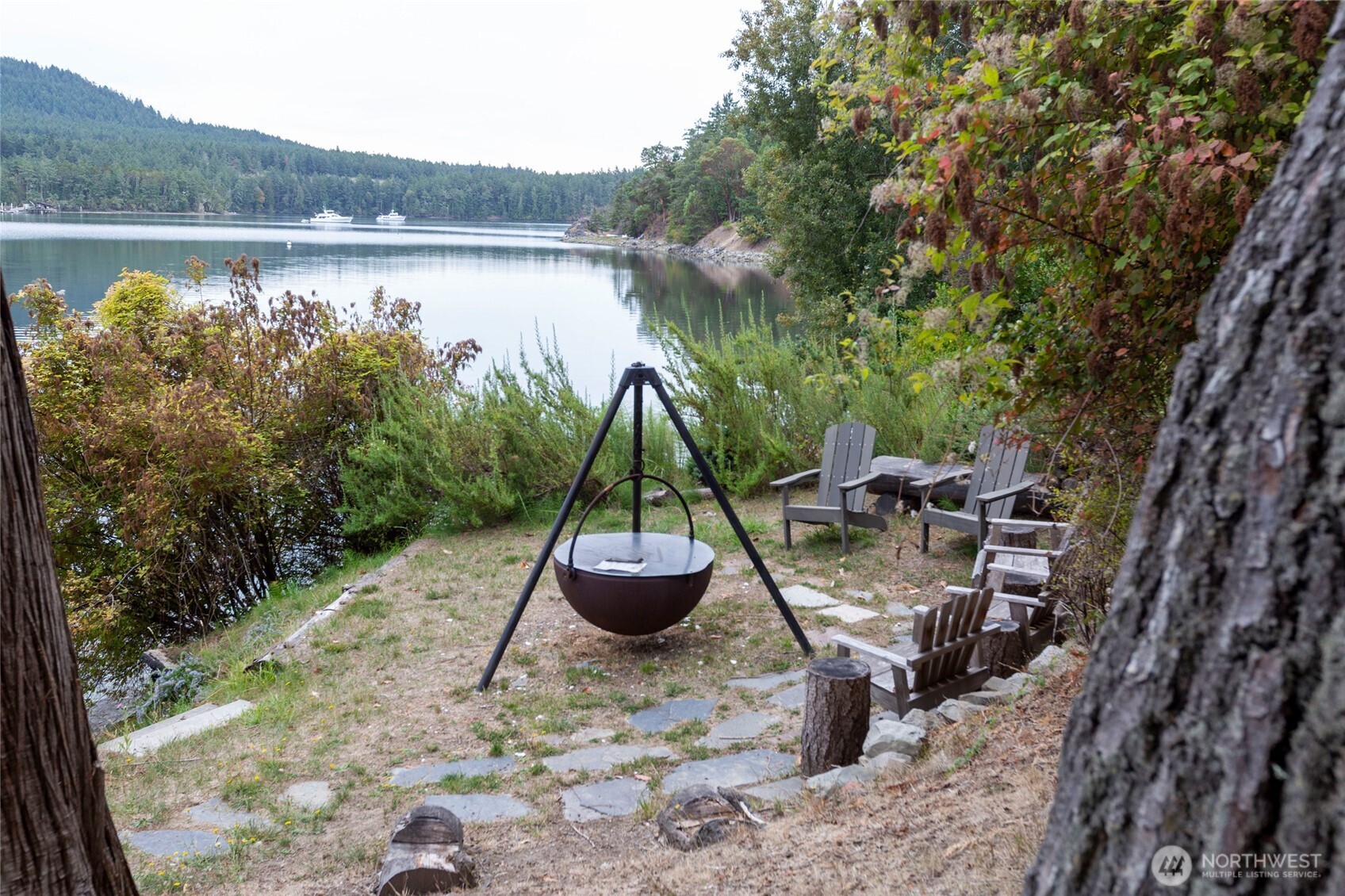 457 White Point Road Friday Harbor, WA 98250 - Photo 32 of 39 a view of a backyard with plants and lake view