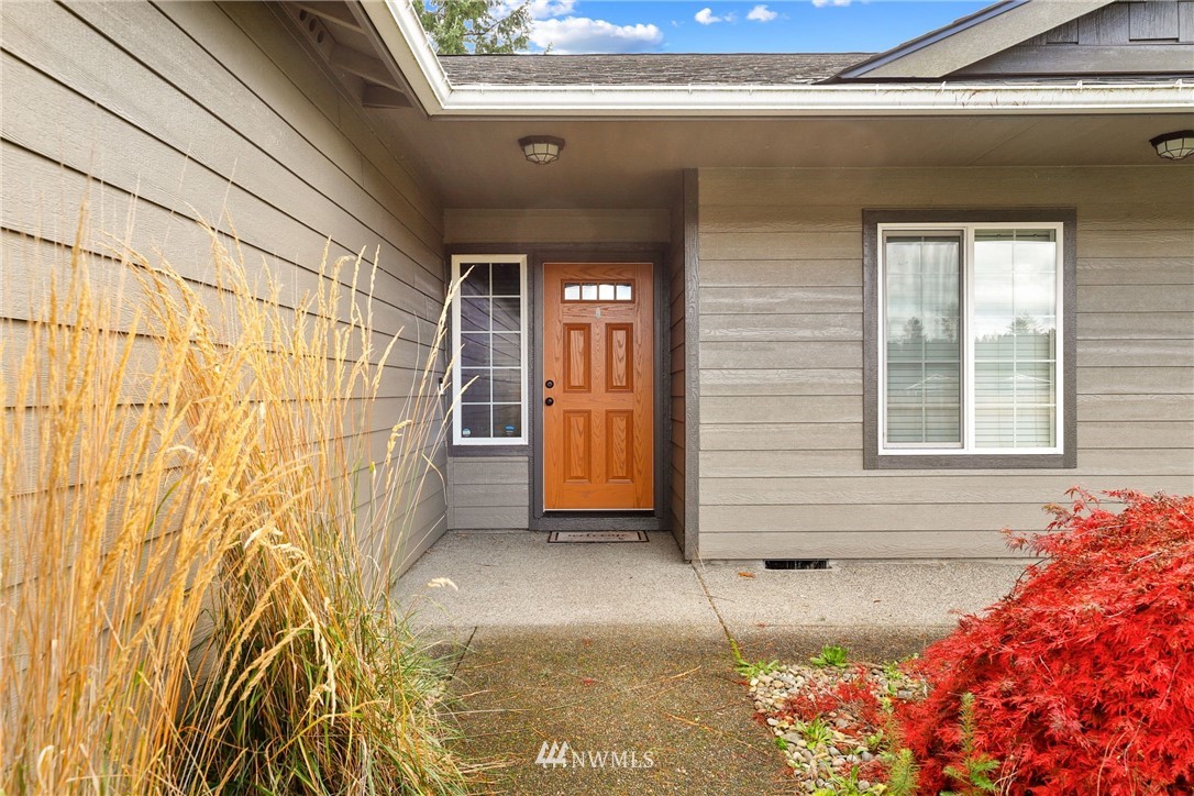 9327 179th Way Southwest Rochester, WA 98579 - Photo 2 of 20 a view of front door of house