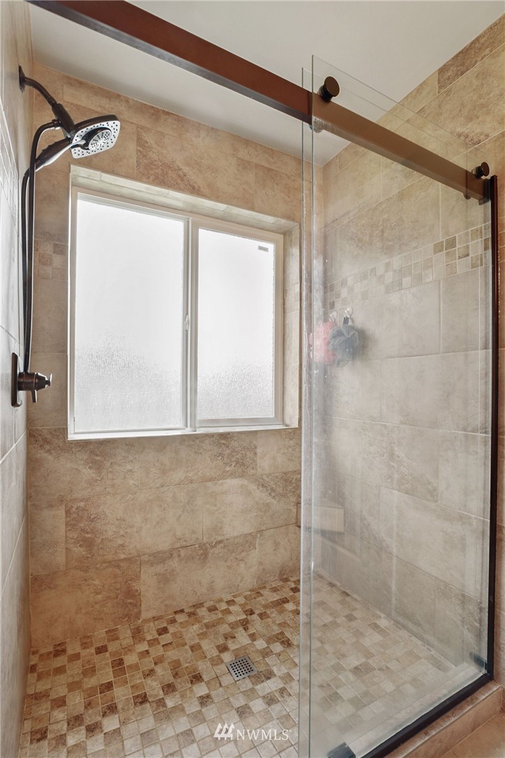 9327 179th Way Southwest Rochester, WA 98579 - Photo 13 of 20 a bathroom with a shower