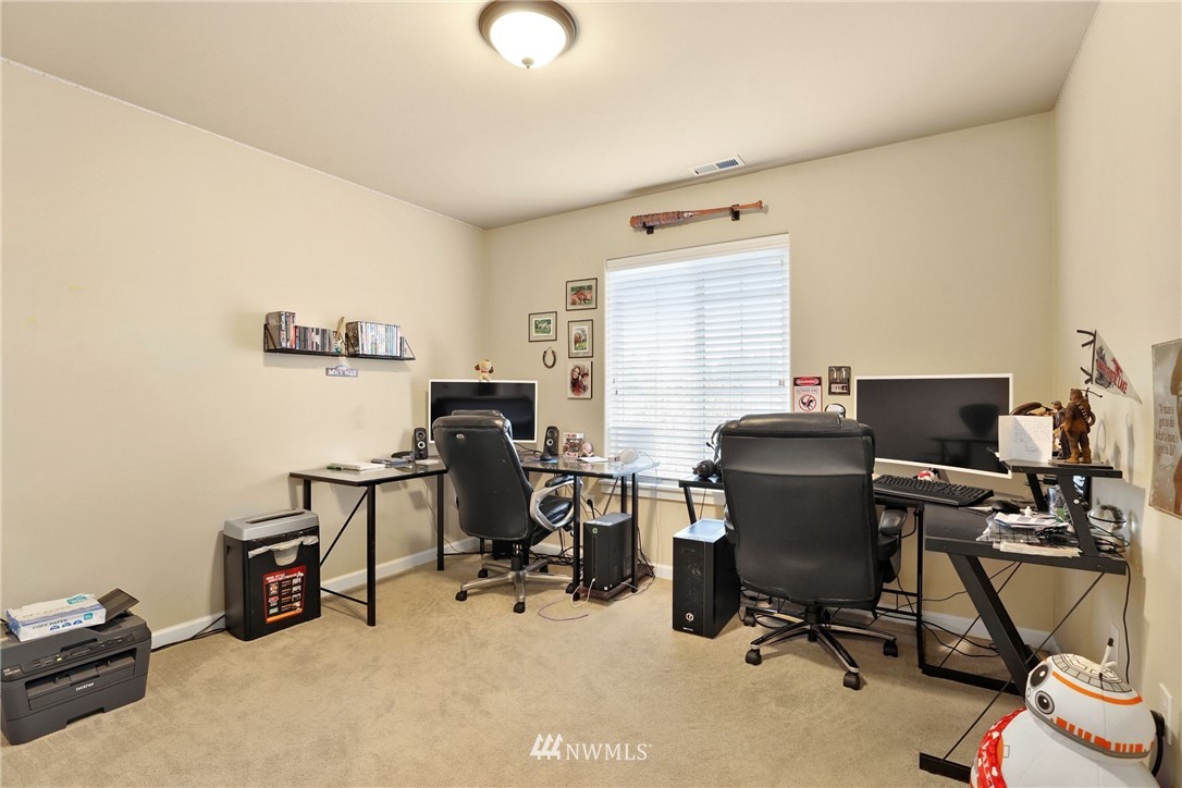 9327 179th Way Southwest Rochester, WA 98579 - Photo 14 of 20 a view of a workspace with furniture and a window